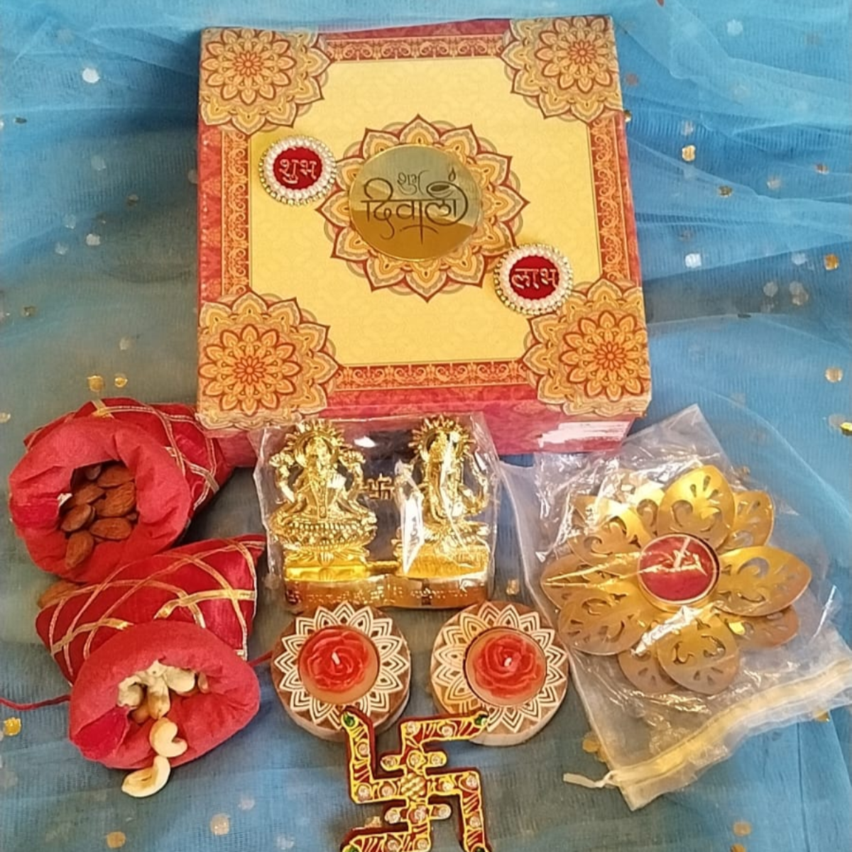 Diwali Gift Hamper with Designer Scented Candles, 2 packs of Dry Fruits, Metallic Idols3